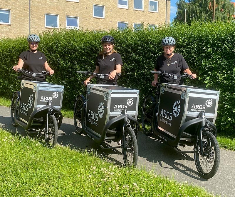 Aros Facility Service — teamet på ladcykler